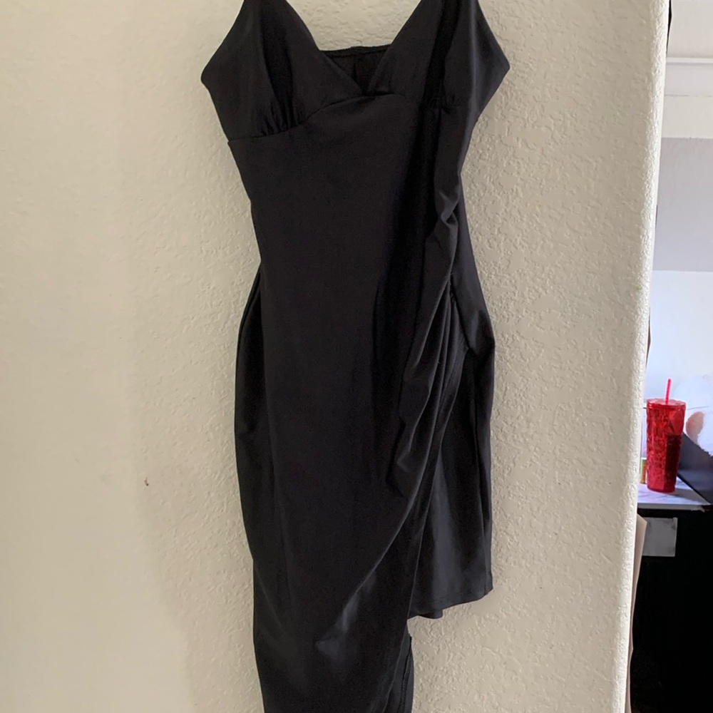 cute tight black dress with fun unique slit